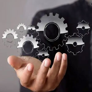 A man holding a virtual gear wheel - Vision Law
